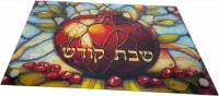 Glass challah tray with a pomegranate pattern symbolizing abundance