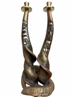 A candlestick made of intertwined antelope horns