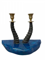 A candlestick made of sheep's horns