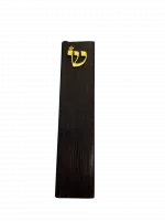 A case for a mezuzah with a small pattern ש