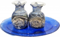 A pair of pomegranate-shaped candlesticks, made of silver-plated glass, blue, handmade
