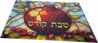 Glass challah tray with a pomegranate pattern symbolizing abundance