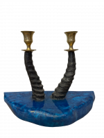 A candlestick made of sheep's horns